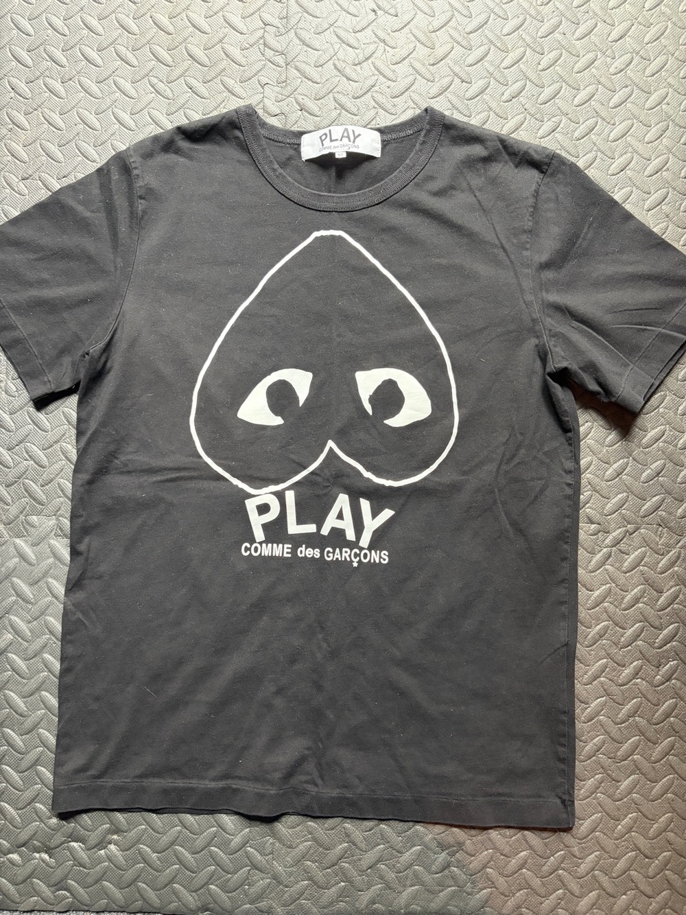 Comme des Garçons PLAY Black Tee with White Heart-Eye Graphic